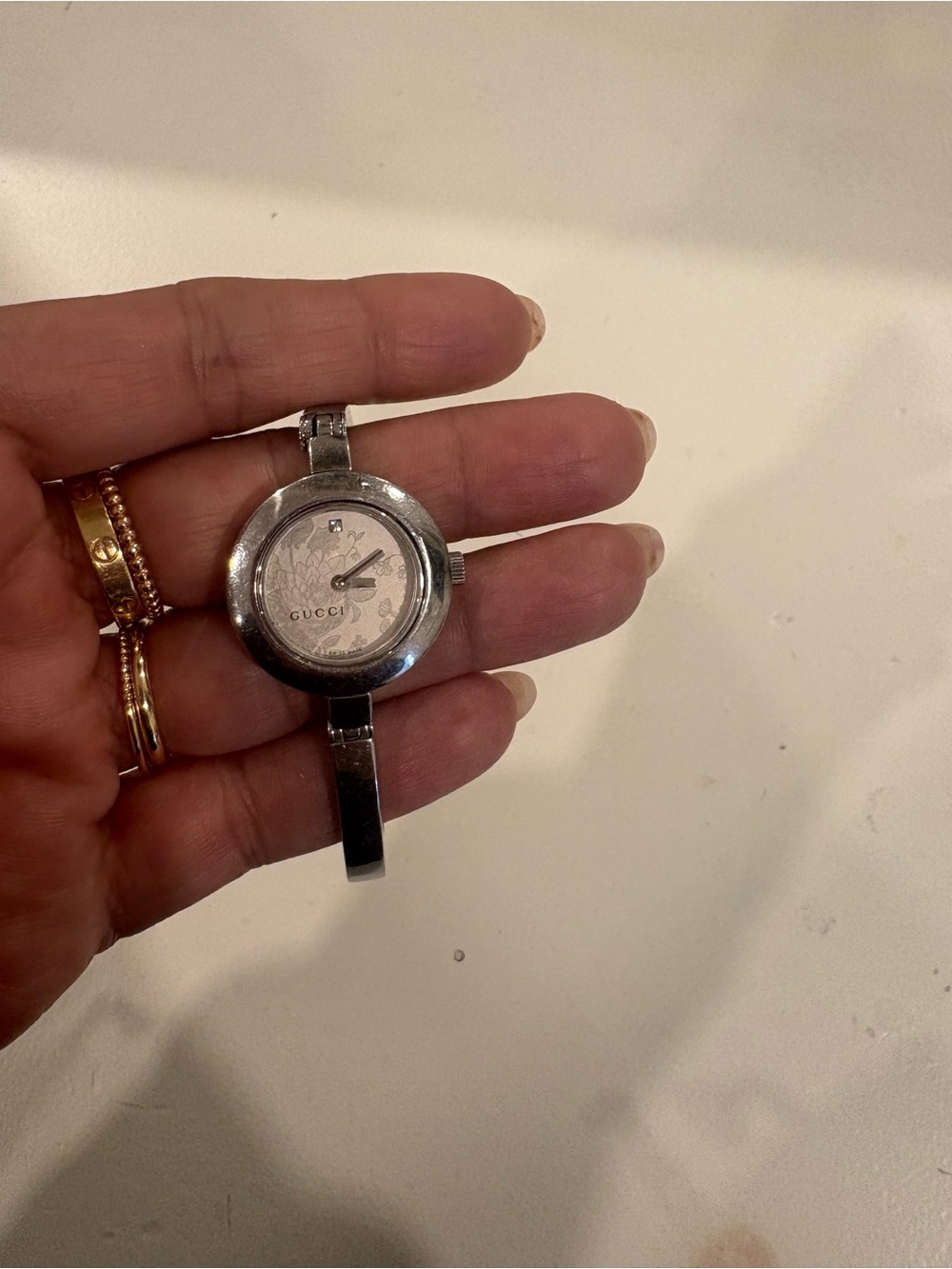Gucci Silver Floral Dial Bangle Watch